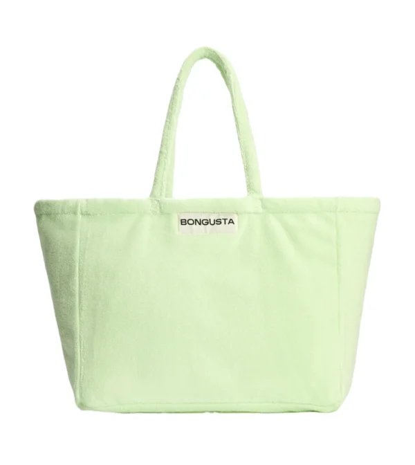 Bolso de playa weekend de Bongusta en tejido toalla verde limón: amplio, cómodo y perfecto para llevar lo imprescindible en escapadas de fin de semana o días de playa.