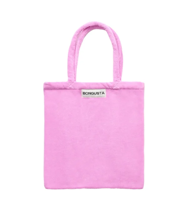 Bolso tote a color fucsia de Bongusta en tejido toalla: práctico, ligero y perfecto para llevar lo esencial en tu día a día, escapadas o días de playa.