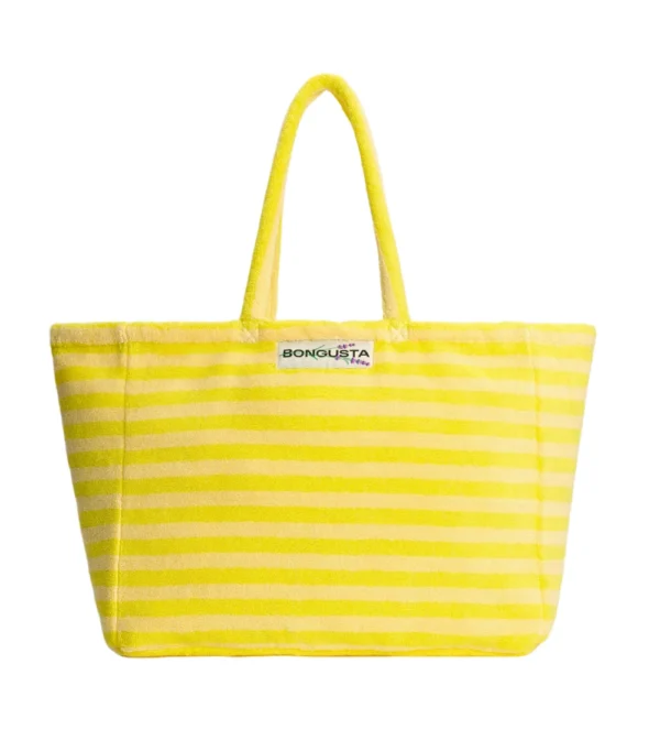 Bolso weekend de Bongusta en tejido toalla amarillo: amplio, cómodo y perfecto para llevar lo imprescindible en escapadas de fin de semana o días de playa.