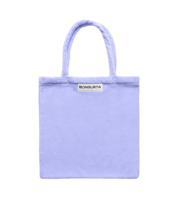 Bolso tote lavanda de Bongusta en tejido toalla: práctico, ligero y perfecto para llevar lo esencial en tu día a día, escapadas o días de playa.