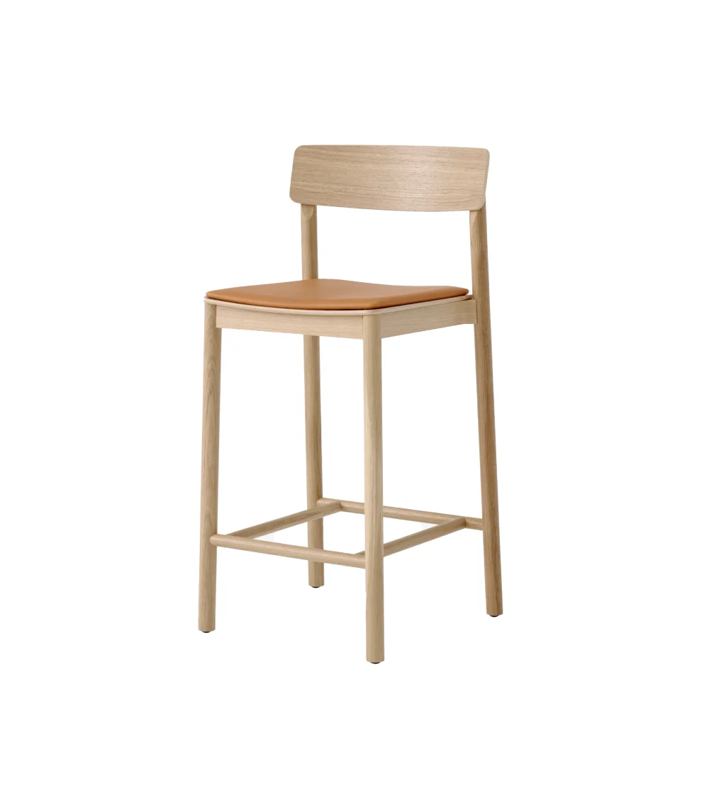taburete acolchado de madera clara