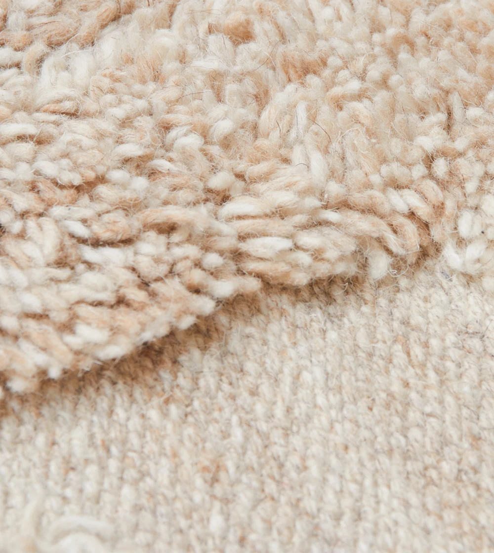 alfombra de lana color crema de HKLIVING
