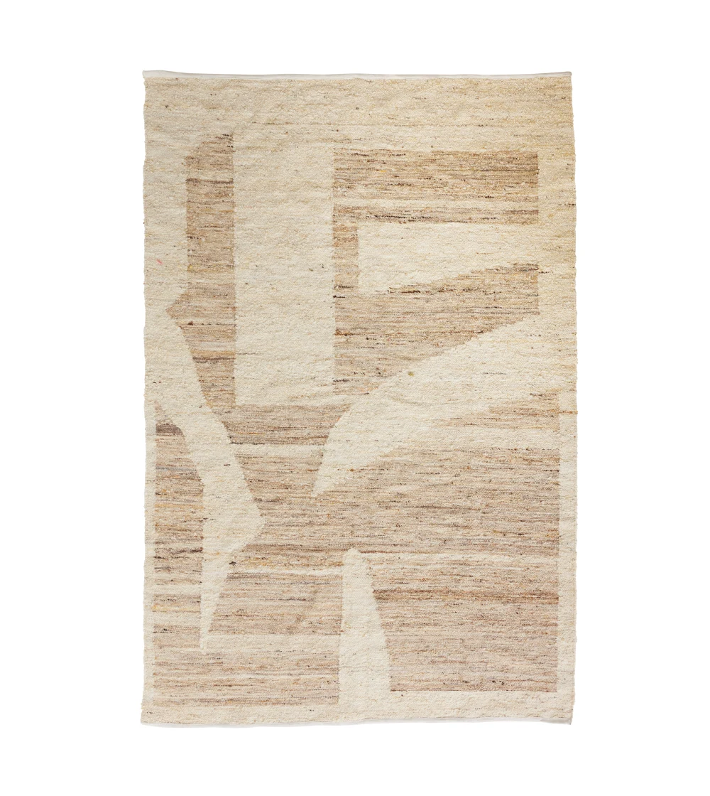 alfombra de lana Contour de HKLIVING en salón contemporáneo aportando calidez y equilibrio al espacio.