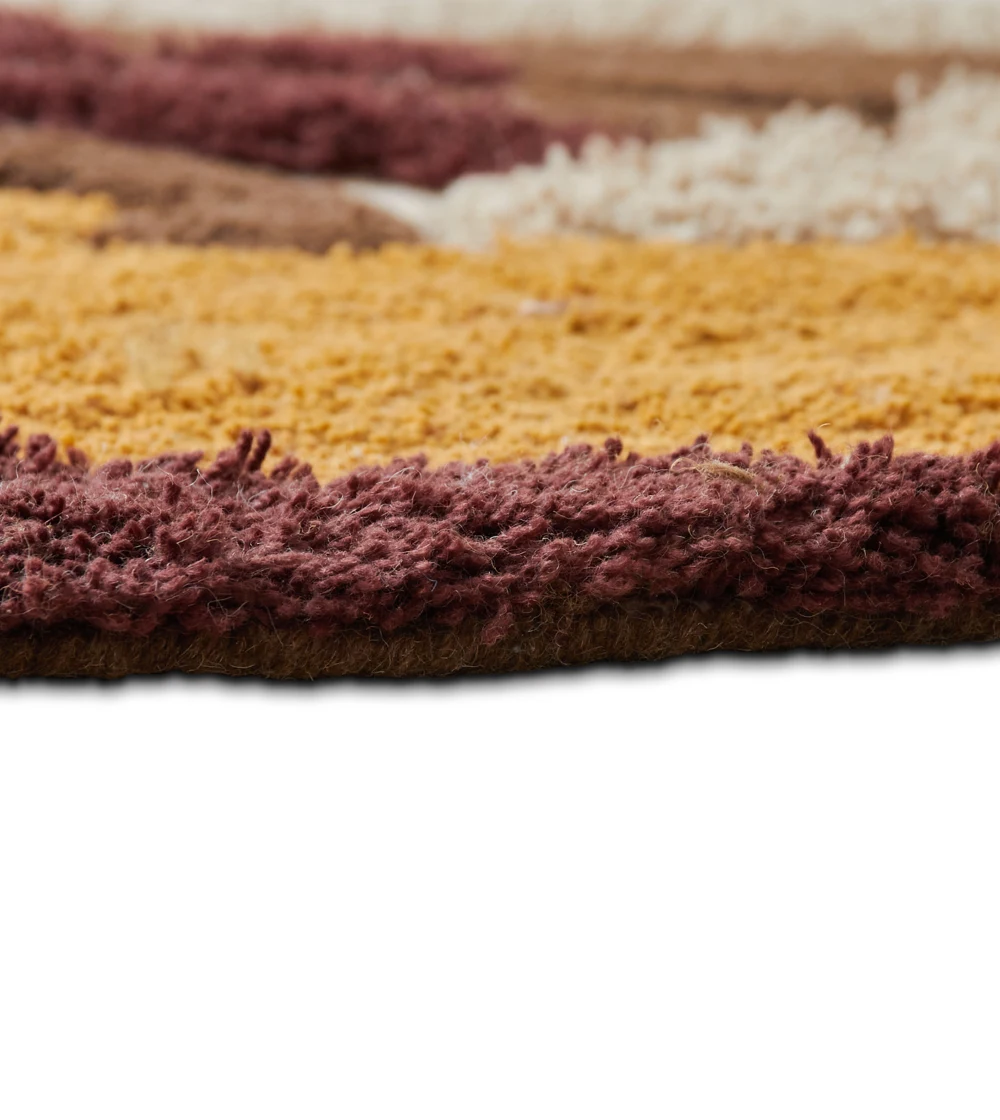 alfombra redonda suave en tonos tierra de HKLIVING con patrón natural y textura mullida en interior contemporáneo.