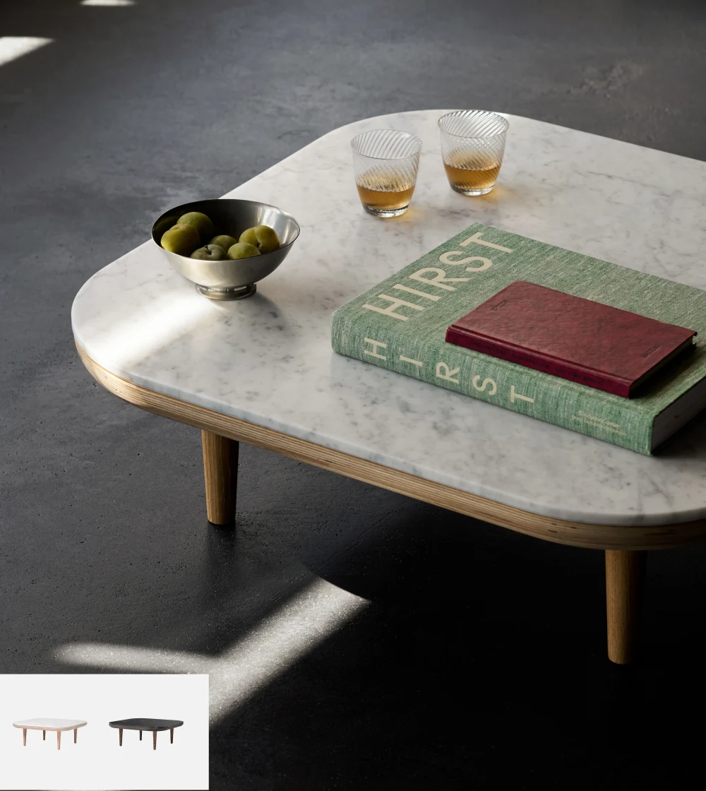Mesa auxiliar baja Fly de Space Copenhagen en salón contemporáneo, diseño minimalista y funcional.