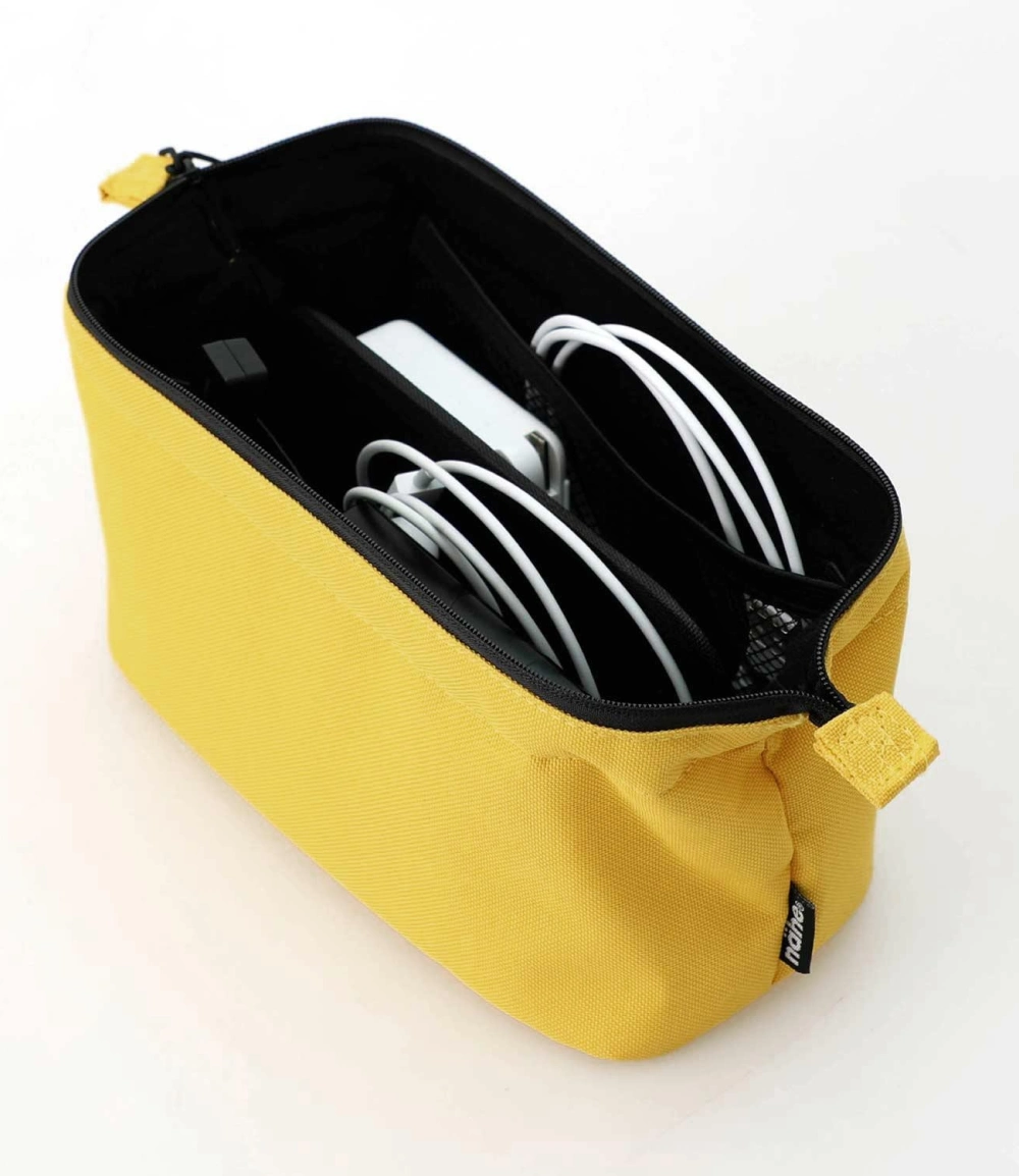 neceser de viaje para gadgets amarillo hecho en japón de nähe