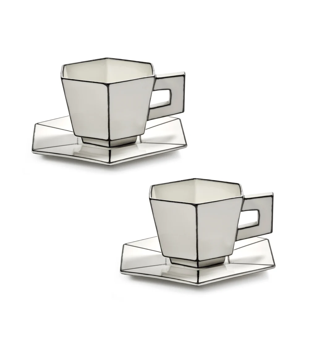 Taza de cappuccino con platillo Carte Blanche de Serax en blanco y negro, diseñada por Annebet Philips.