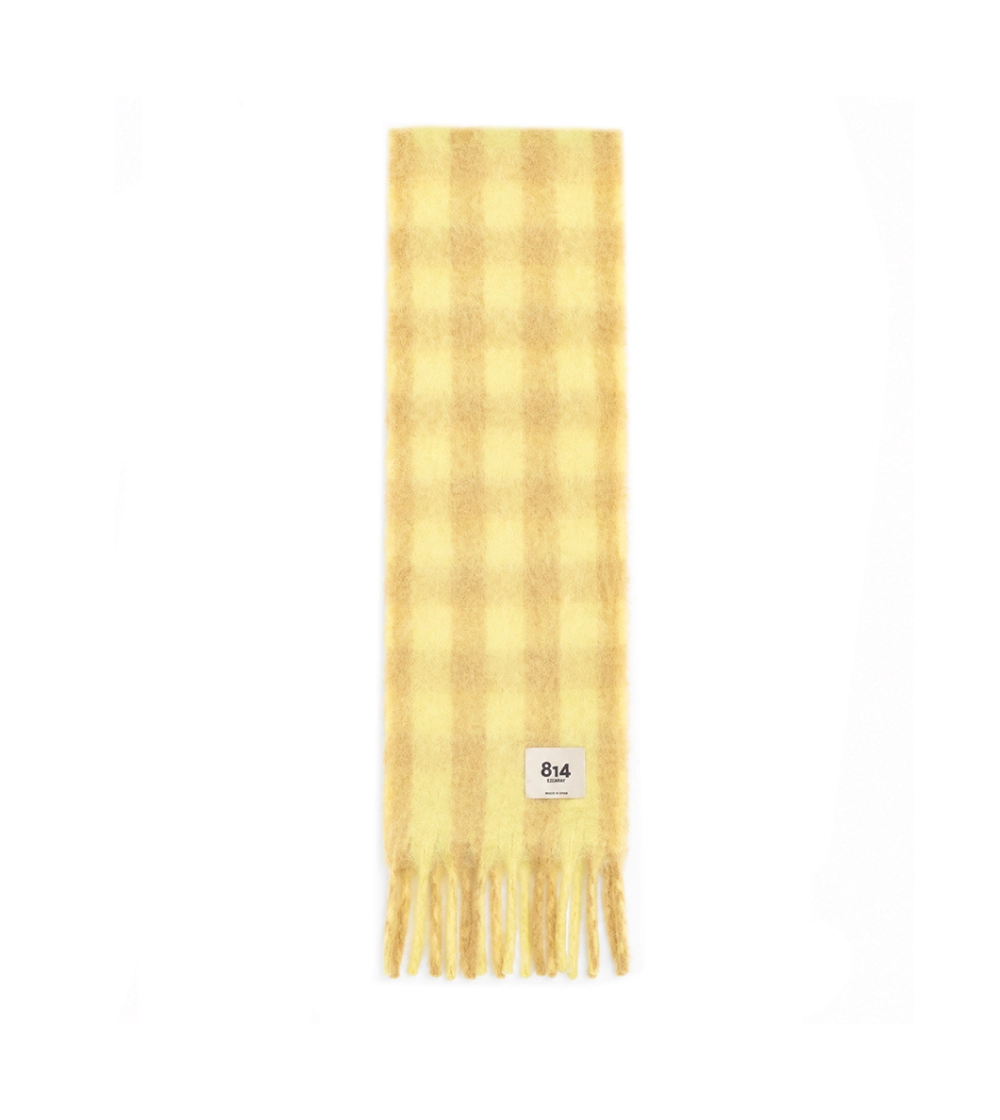 Bufanda Stripy Vichy de Ezcaray en mohair y lana, con estampado de cuadros bicolor en amarillo y beige y flecos.