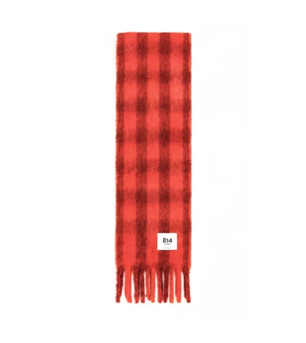 Bufanda Stripy Vichy de Ezcaray en mohair y lana, con estampado de cuadros bicolor en naranja y marron y flecos.