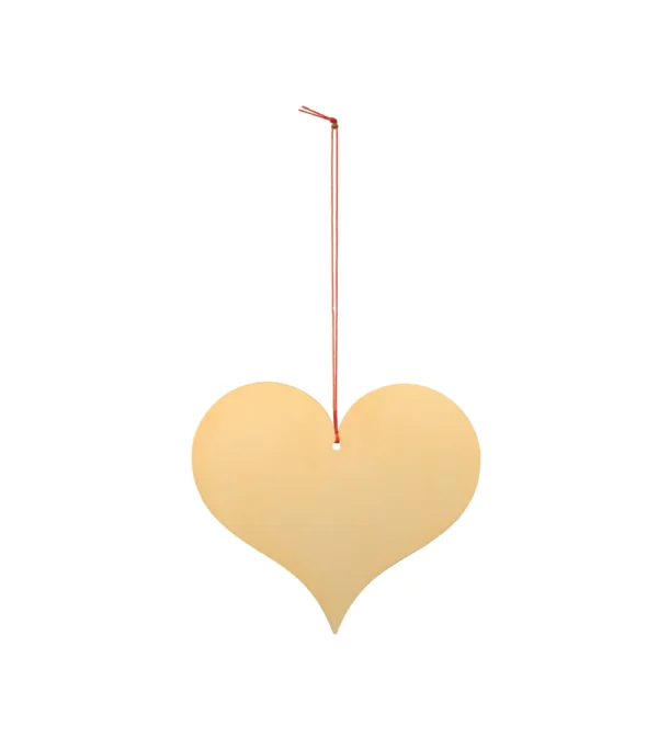 Adorno de navidad dorado con forma de corazón de la colección Girard Ornaments de Vitra diseñado por Alexander Girard, elaborado en metal con efecto latón pulido y disponible en distintos formas.