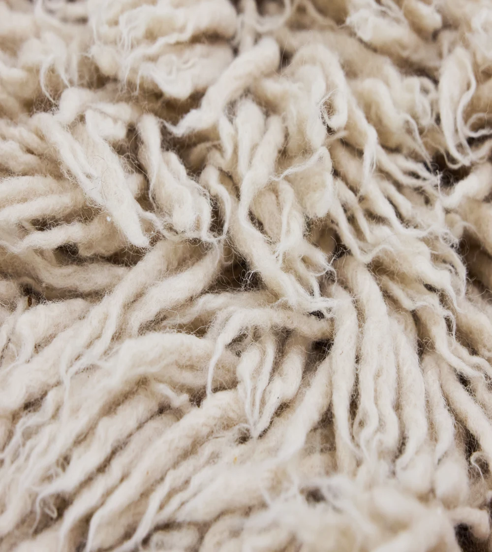 Alfombra de lana beige de HKLIVING de 150 × 240 cm, de diseño atemporal y tono natural, ideal para decorar salones y dormitorios con una alfombra de diseño.