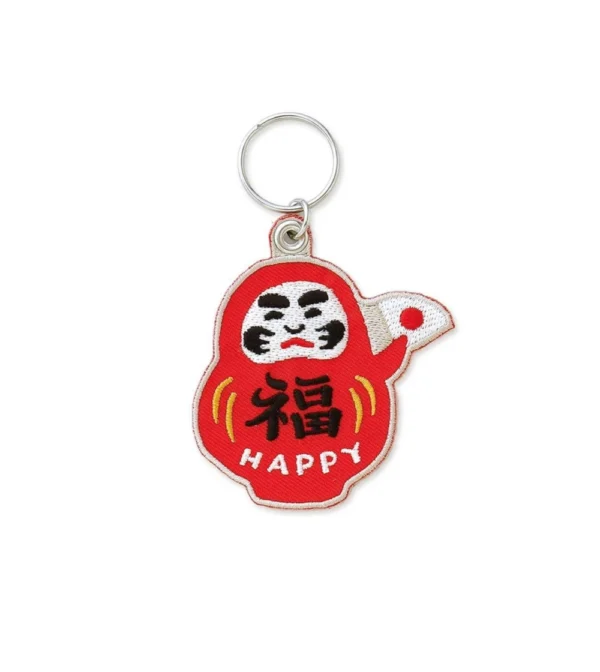 Llavero Daruma japonés bordado de HIGHTIDE, amuleto tradicional de la buena suerte y la perseverancia, ideal para decorar llaves, bolsos y mochilas.
