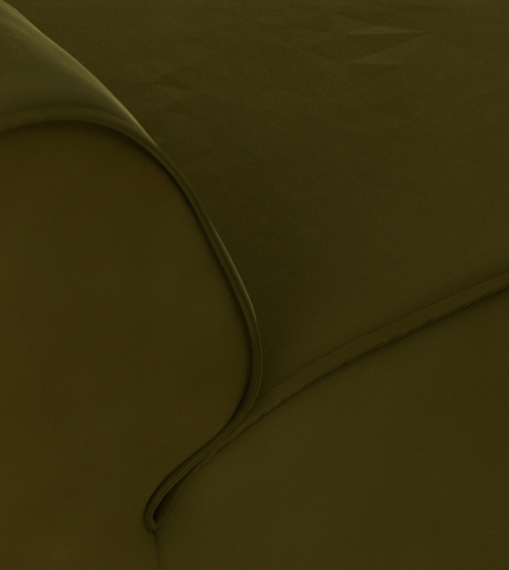Sofá modular Flake de HKLIVING, ideal para crear una composición de sofá a medida con tapizado terciopelo verde oscuro para salones modernos de diseño nórdico
